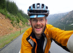 [Mile 612] Flying up the pass, feeling great, and absolutely amazing views in the snowy peaks with a huge valley behind me. — in Washington.